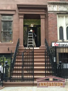 Repaired lintel and window sill on Manhattan brownstone