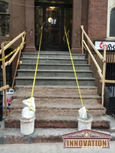 Street view of East Village brownstones showcasing uniform architecture