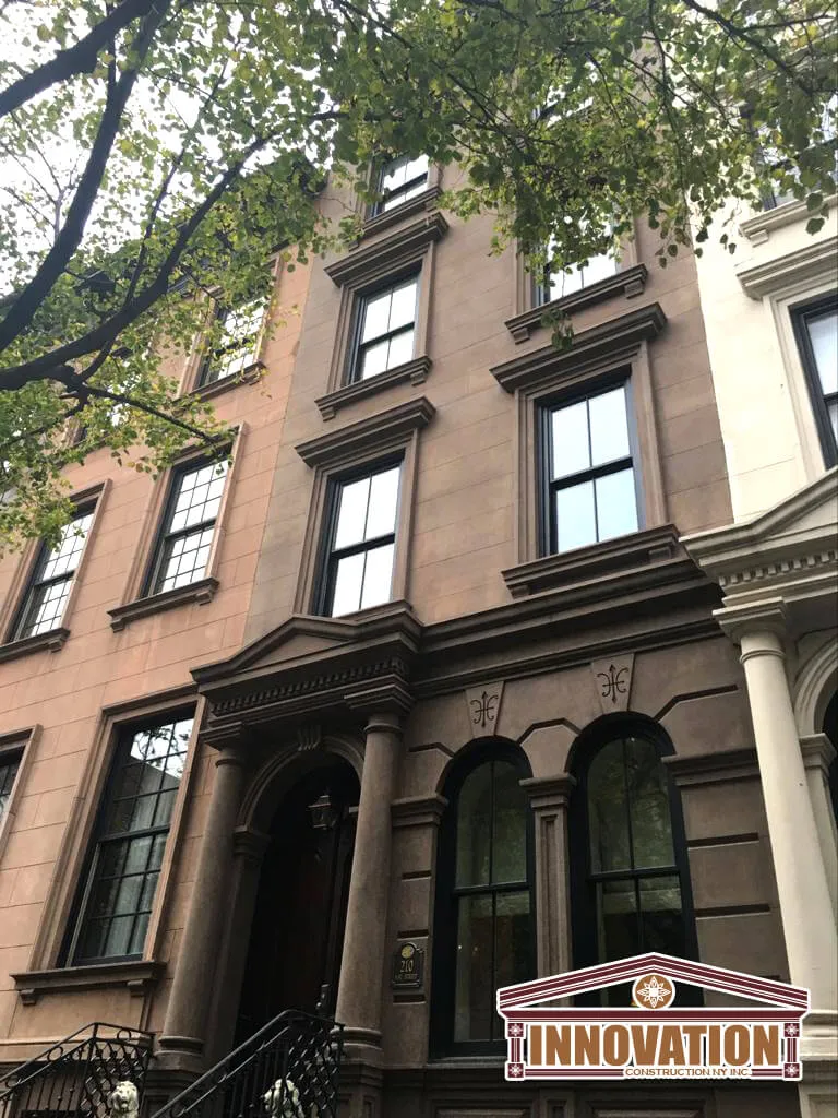 Facade and lintel repair on historic Manhattan brownstone