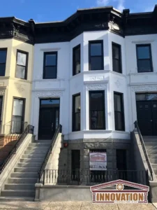 Brownstone and cornice work with exterior painting