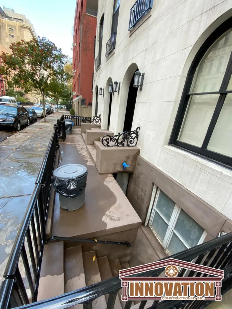 Mason repairing historic Brooklyn stoop