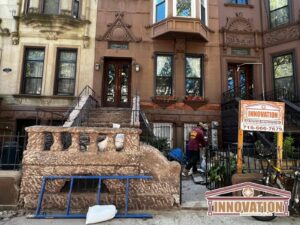 Detailed stone repair Brooklyn brownstone stoop restoration