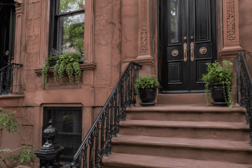 Carroll Gardens Brownstone Restoration with restored Italianate brownstone facade, cast-iron railings, and front stoop in Brooklyn